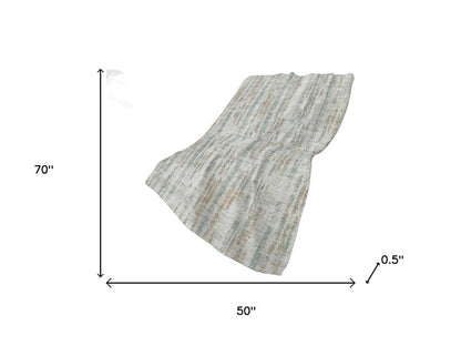 50" X 70" Ivory And Blue Abstract Polyester Woven Plush Throw Blanket