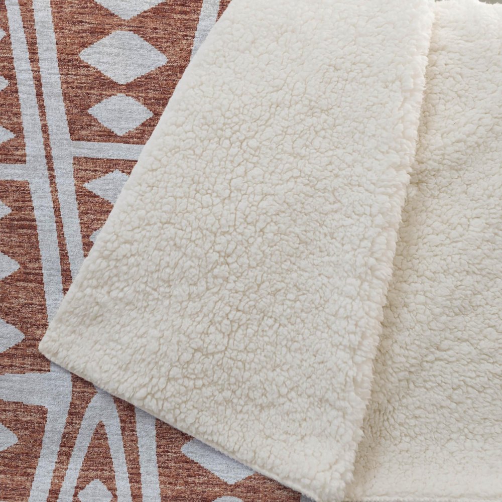 50" X 70" Rust And Beige Geometric Polyester Woven Plush Throw Blanket