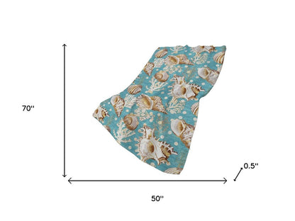 50" X 70" Aqua Brown And Ivory Animal Print Polyester Woven Plush Throw Blanket