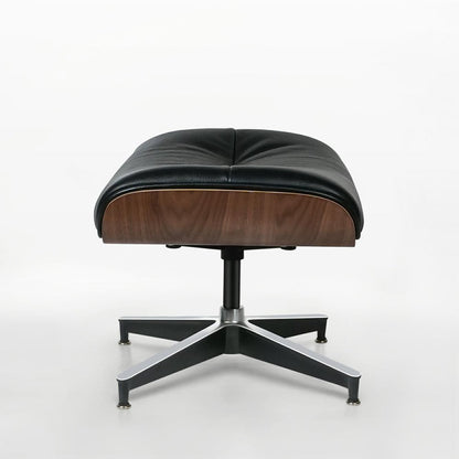 33" Black and Walnut Leather And Wood Swivel Lounge Chair With Ottoman