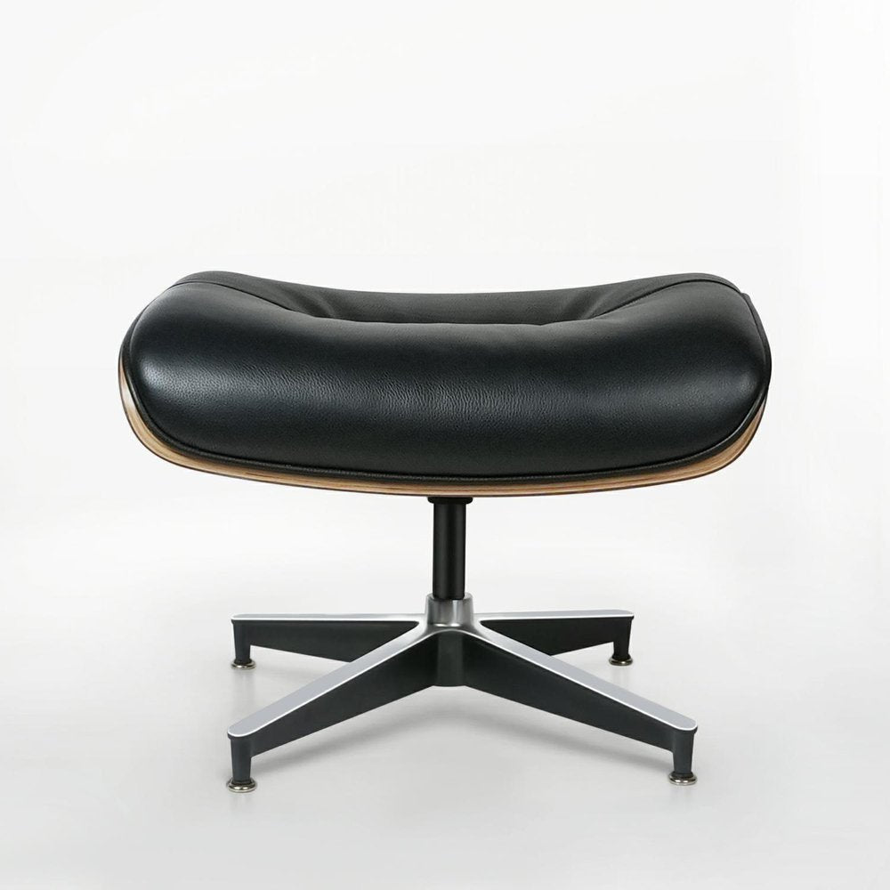 33" Black and Walnut Leather And Wood Swivel Lounge Chair With Ottoman