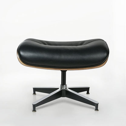 33" Black and Walnut Leather And Wood Swivel Lounge Chair With Ottoman