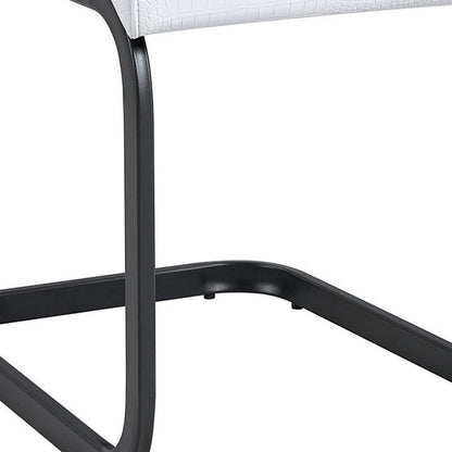 Set of Four White and Black Faux Leather Dining Side Chairs